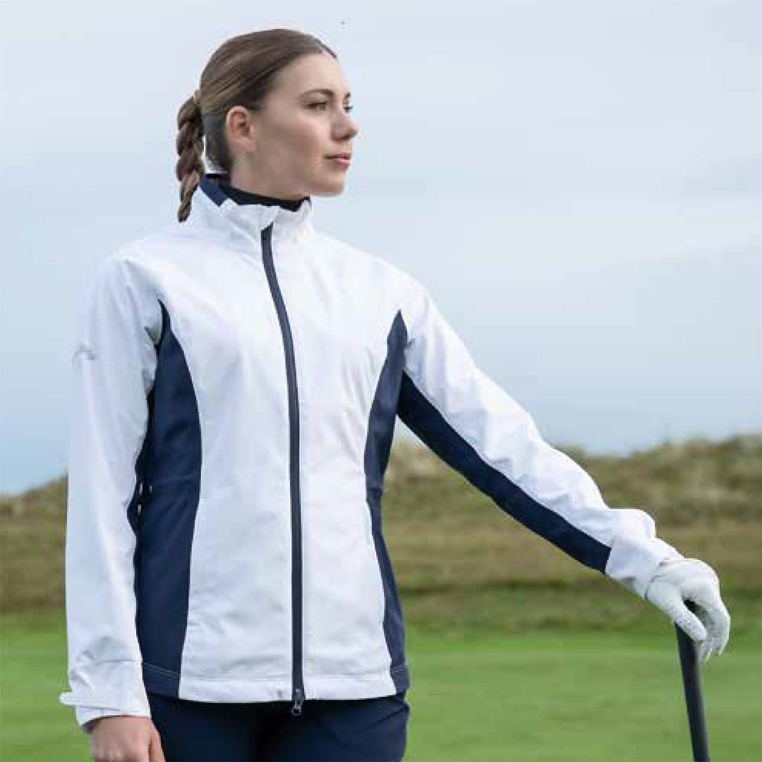 Callaway Stormlite ladies waterproof golf jacket in white with navy panels and trim from GolfGarb