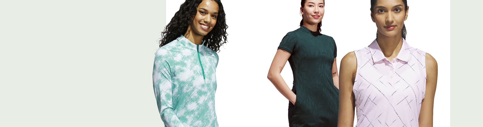 Three women wearing adidas golf autumn winter 2025 clothes: An aqua and white print long sleeve zip neck, a deep green short sleeve dress and light pink sleeveless print polo