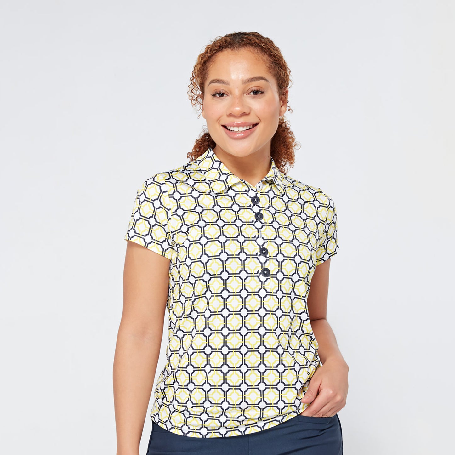 Swing Out Sister Ladies Cap Sleeve Polo in Sunshine and Navy Mosaic Pattern	