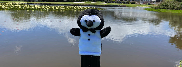 Penguin Pete club head cover on the fairway