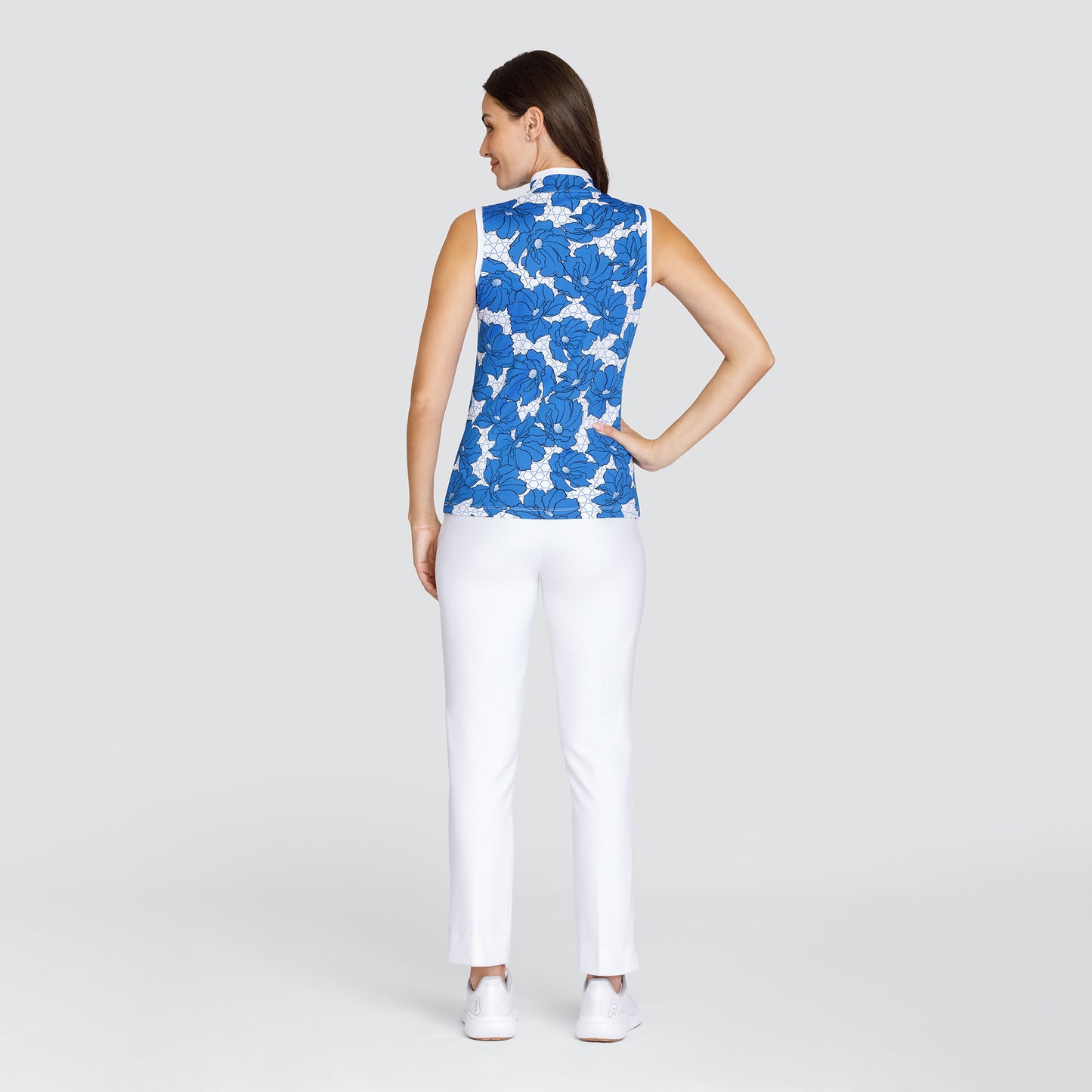 Tail Ladies Sleeveless Polo in a Floral and Hexagonal Print 