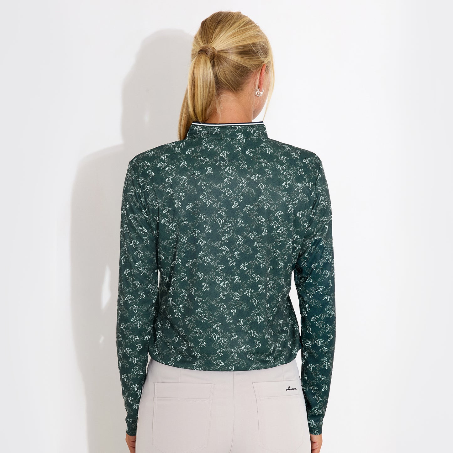 Abacus Ladies Zip-Neck Top with Delicate Leaf Print for Effortless Style & Comfort with Every Swing
