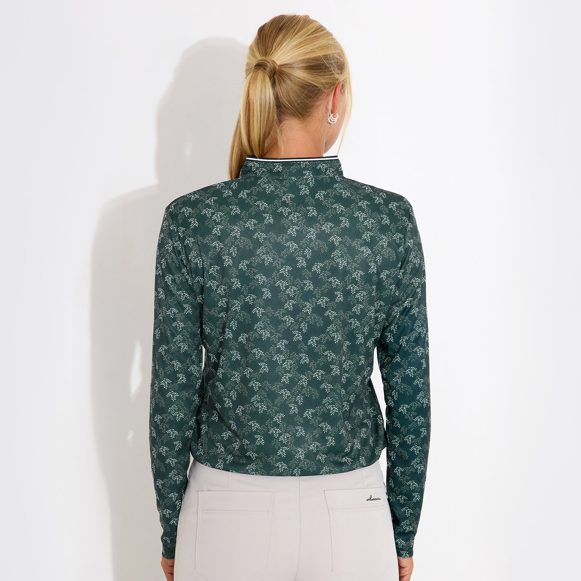 Abacus Ladies Zip-Neck Top with Delicate Leaf Print for Effortless Style & Comfort with Every Swing
