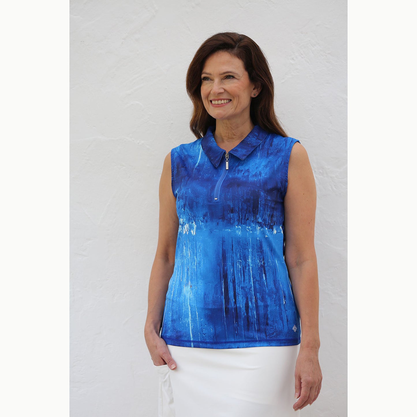 FAMARA Ladies Sleeveless Polo in Abstract Harbourside Print in Blue Lagoon