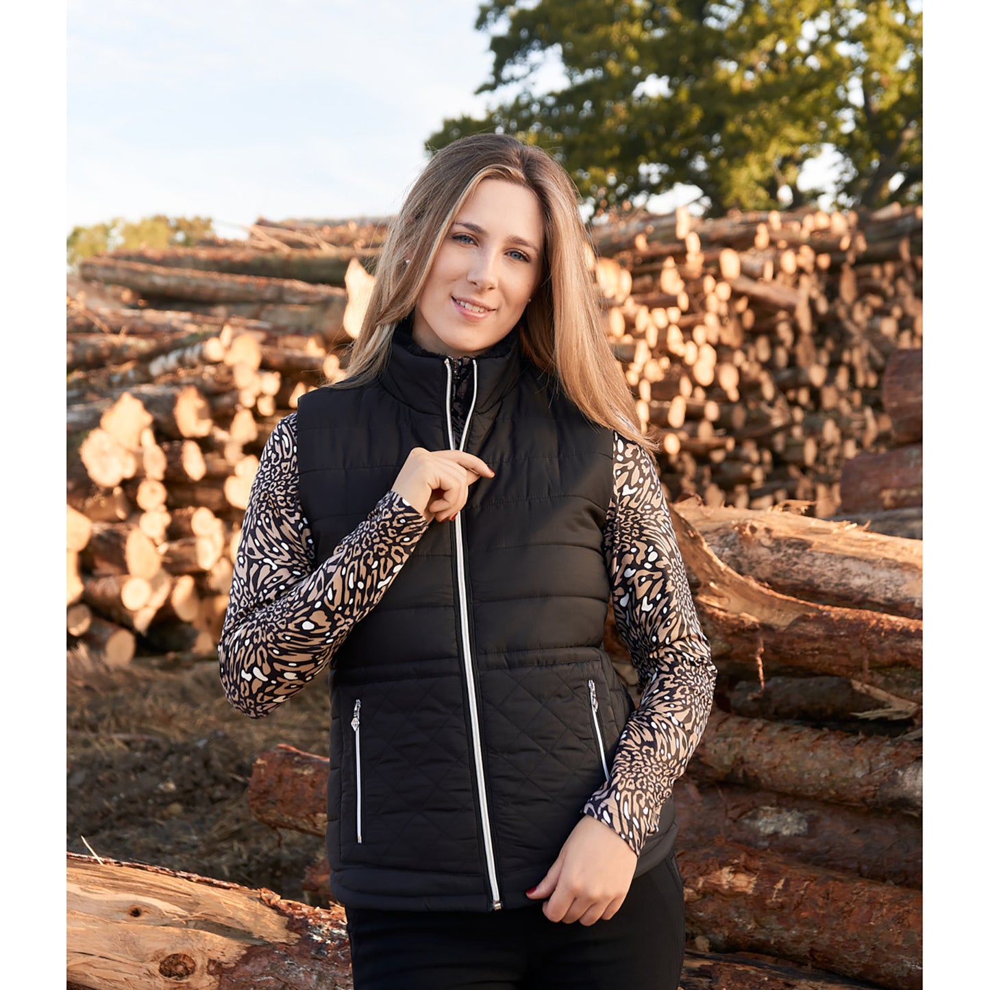 Pure Golf Ladies Reversible Gilet in Black & Wild Truffle