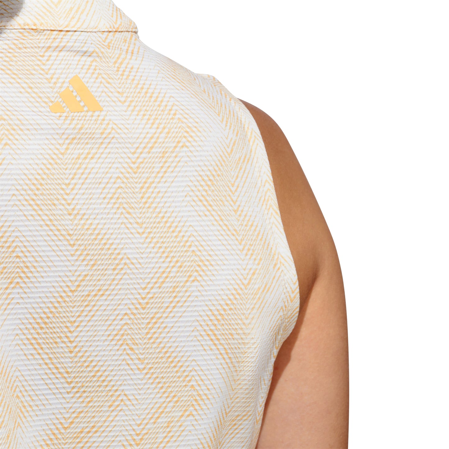 adidas Ladies Sleeveless Golf Polo with Abstract Zig-Zag Print in Semi Spark