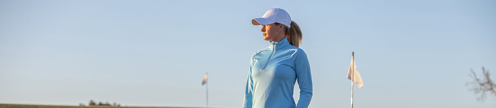 GALVIN GREEN at GolfGarb including this blue Insula zip-neck top