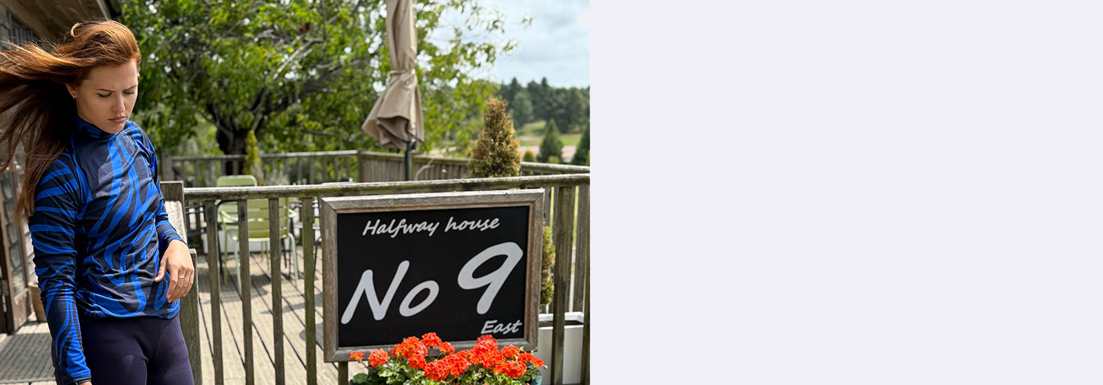 Golfer standing on a wooden deck with a sign reading 'Halfway home No 9' wearing Swing Out Sister's Roll Neck In tiger's Eye Print available at GolfGarb.