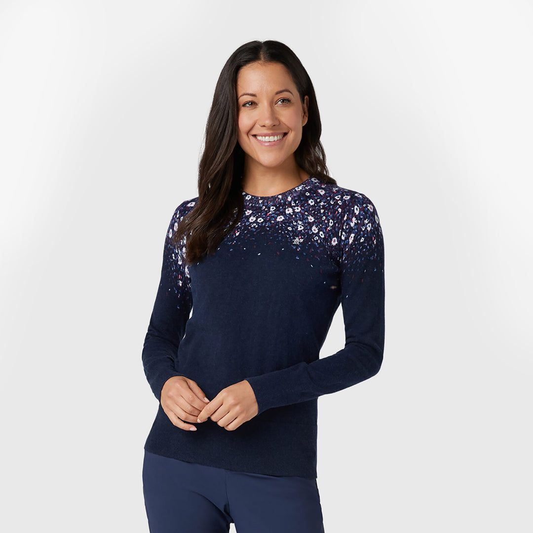 Navy with floral cascade design sweater on a model from Original Penguin