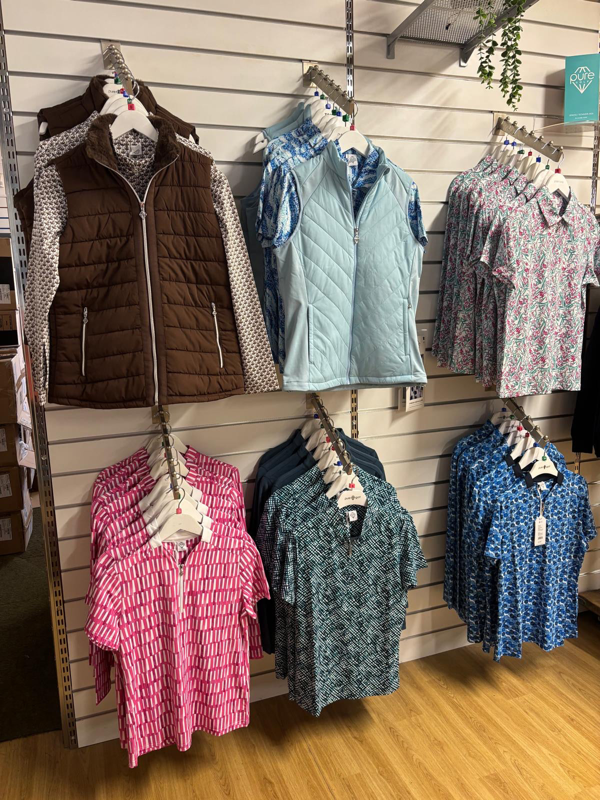 Shop display of ladies Pure Golf autumn winter 2026 collections at Tony Valentine Golf Centre