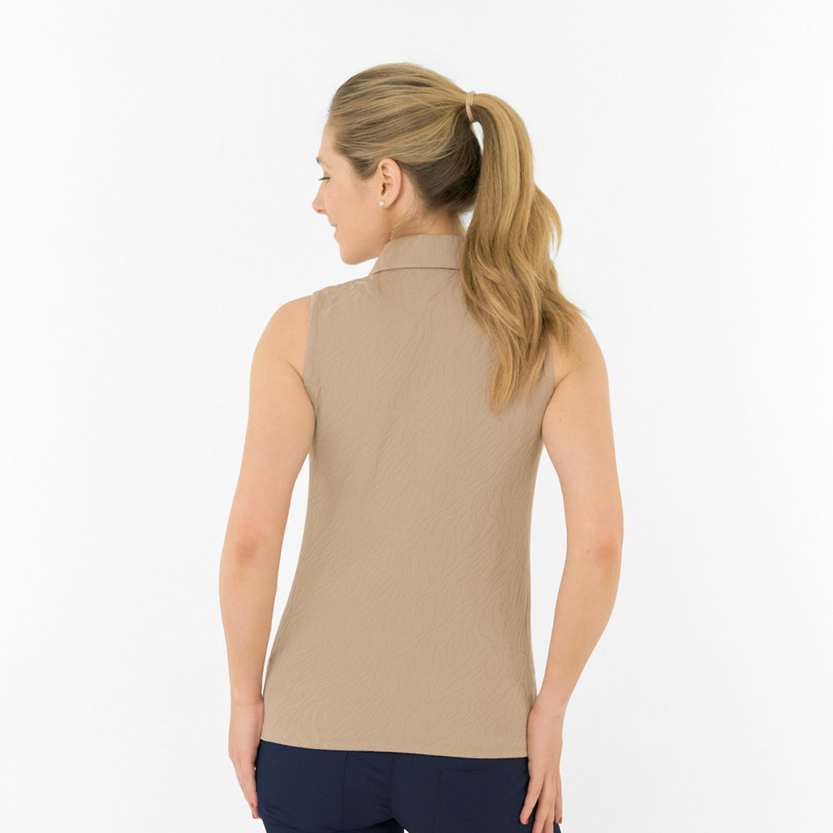 Pure Golf Ladies Textured Sleeveless Polo – Subtle Sophistication Meets Effortless Play