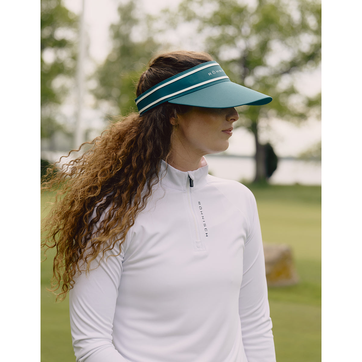 Röhnisch Ladies Elegant Zip Neck Stretch Top for Effortless Movement with Every Swing