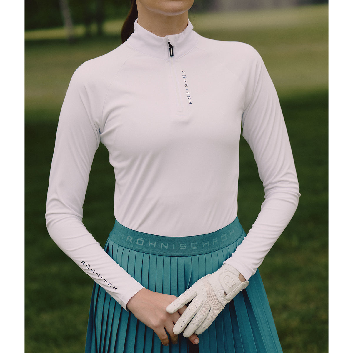 Röhnisch Ladies Elegant Zip Neck Stretch Top for Effortless Movement with Every Swing