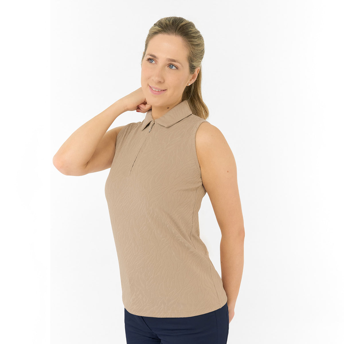 Pure Golf Ladies Textured Sleeveless Polo – Subtle Sophistication Meets Effortless Play