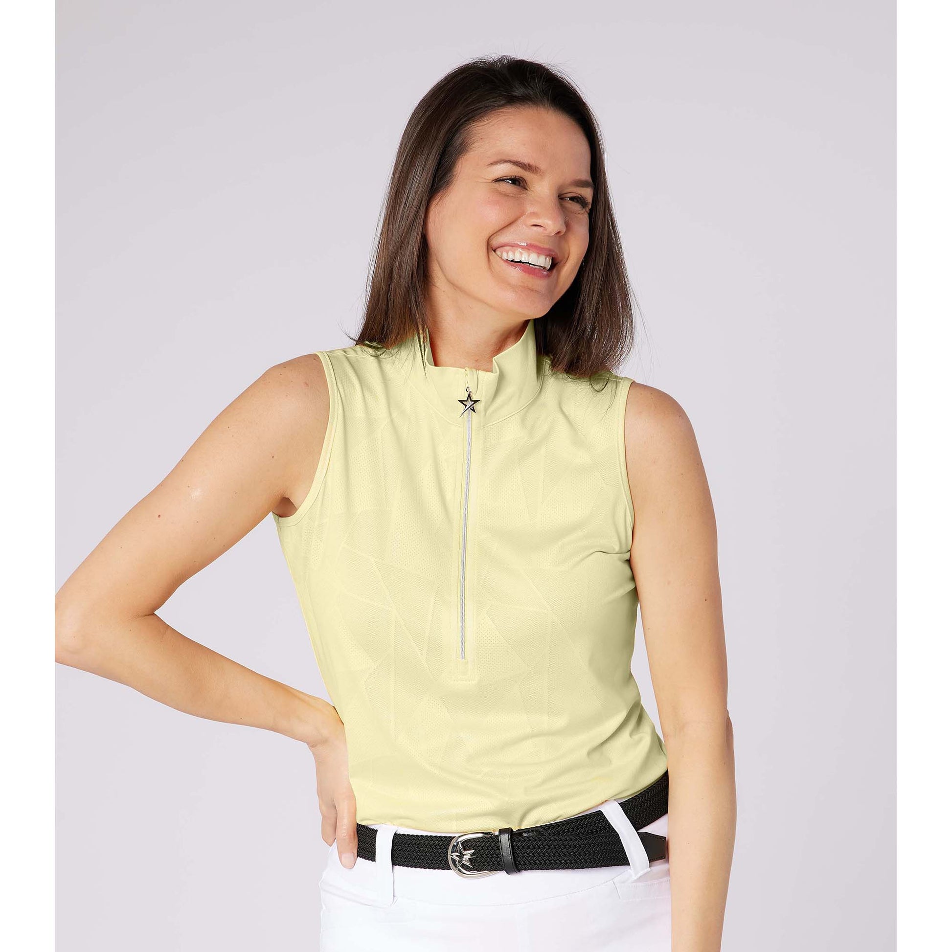 Swing Out Sister Elegant Embossed Ladies Sleeveless Polo with Zip Neck – A Stylish Staple for Every Season