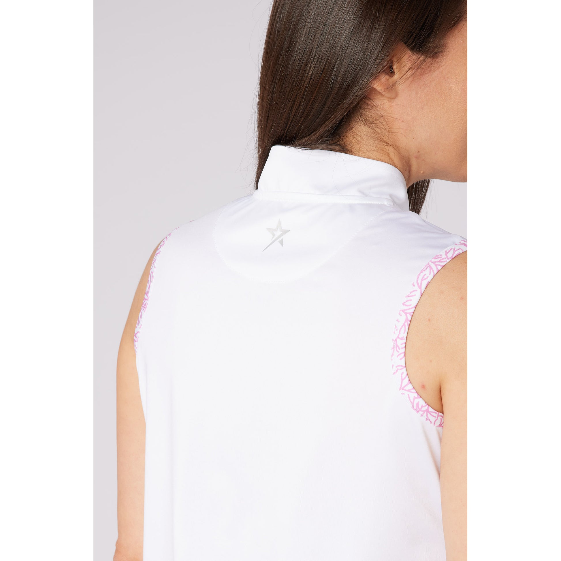Swing Out Sister Ladies Sleeveless Polo With The Perfect Pop Of Print for Subtle Style