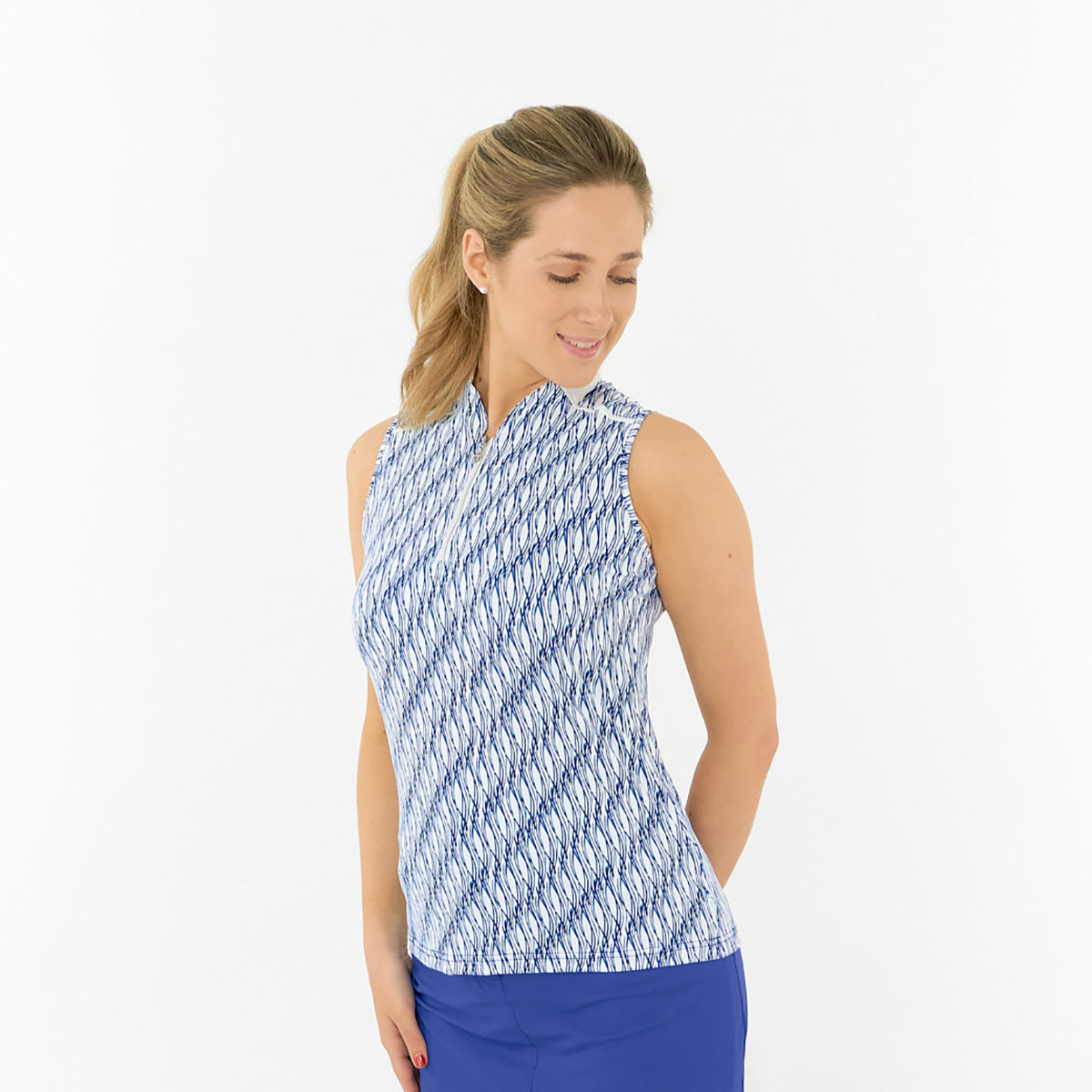 Pure Golf Ladies Sleeveless Polo with Abstract Wave Print for Standout Style on the Course