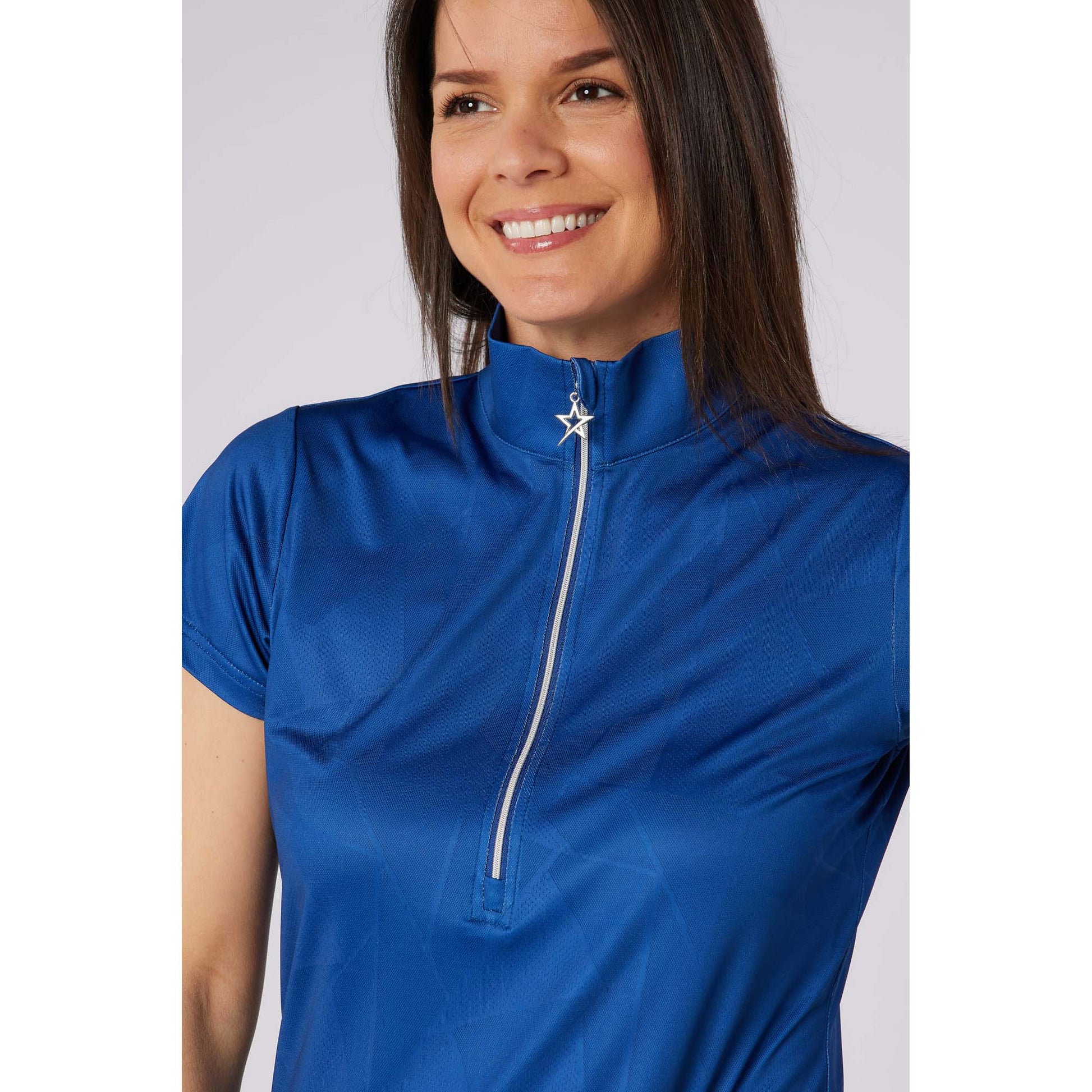 Swing Out Sister Embossed Ladies Polo with Zip Neck – A Stylish Staple for Every Season