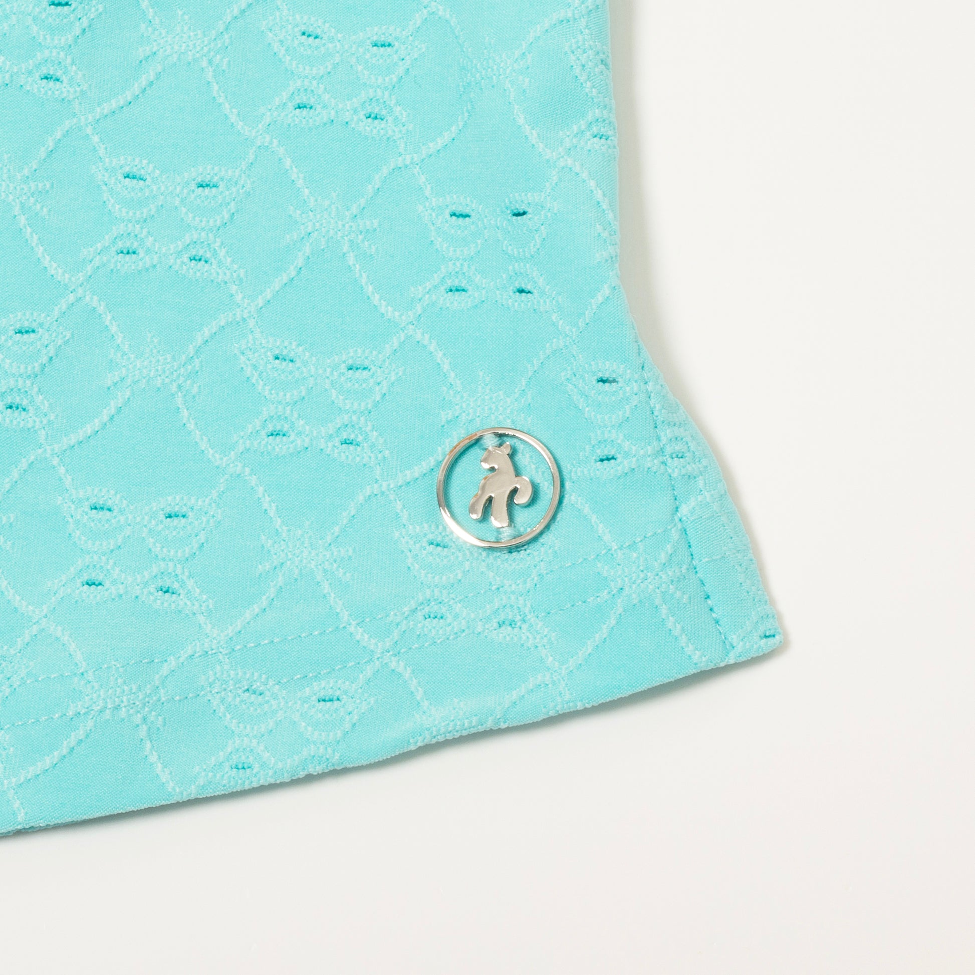 Green Lamb Ladies Sleeveless Polo with Broderie Anglaise Pattern in Aqua