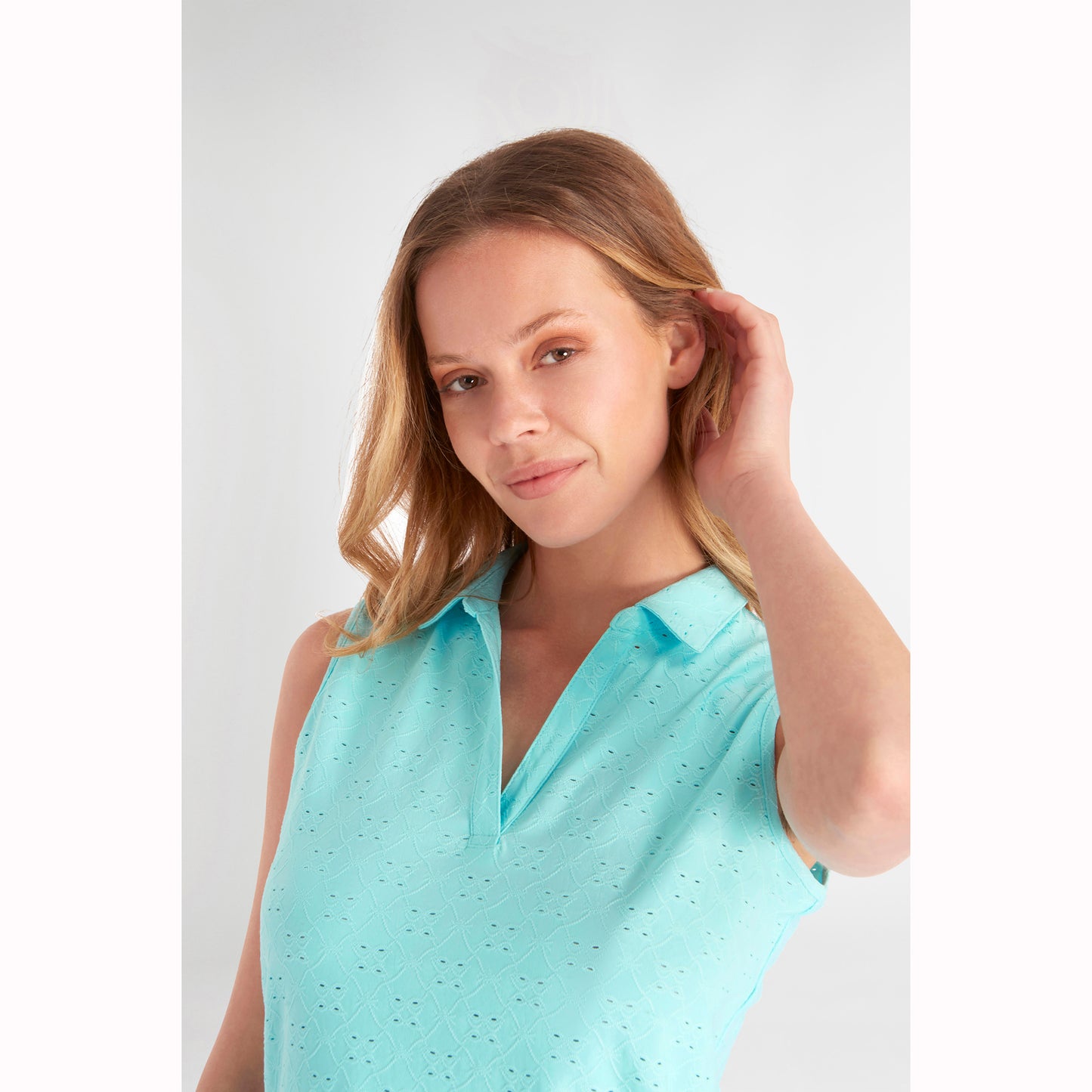 Green Lamb Ladies Sleeveless Polo with Broderie Anglaise Pattern in Aqua