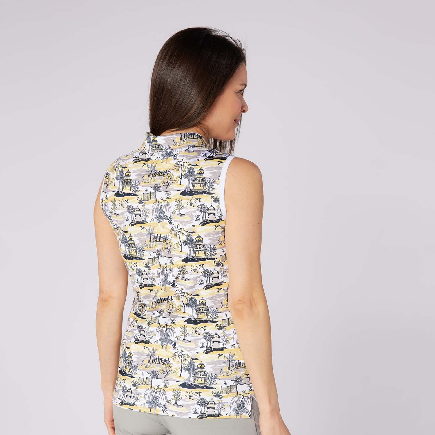 Swing Out Sister Ladies Ultra-Soft Sleeveless Polo with Head Turning Print & Stylish Contrast Trim
