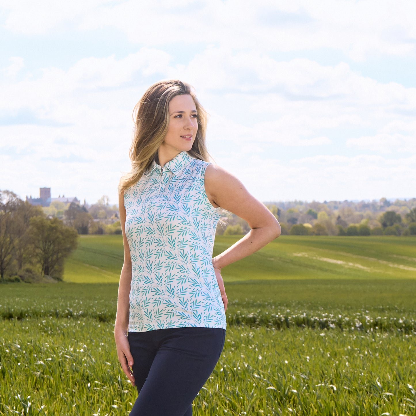 Pure Golf Ladies Amity Sleeveless Polo Shirt in Floating Palms White 