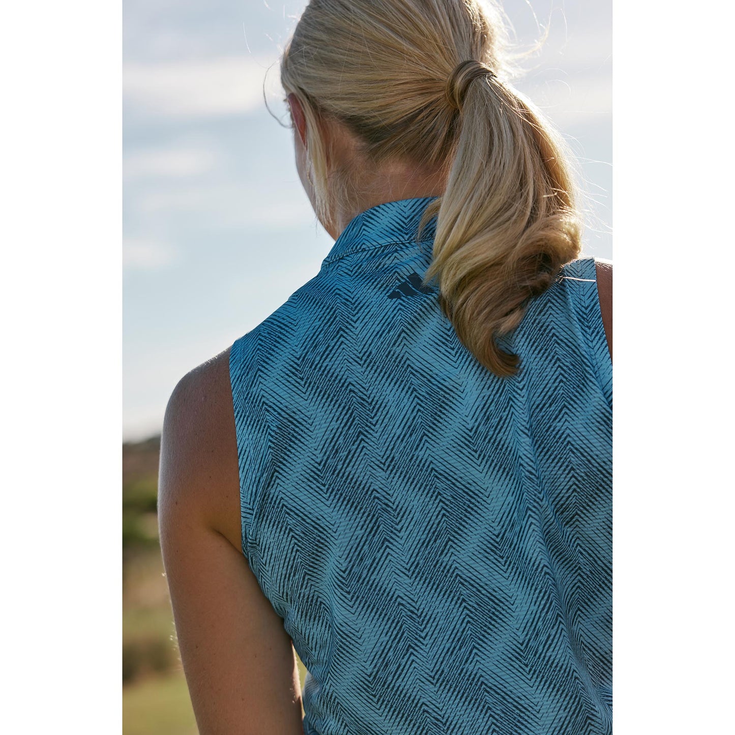 adidas Ladies Sleeveless Golf Polo with Abstract Zig-Zag Print in Semi Blue Burst