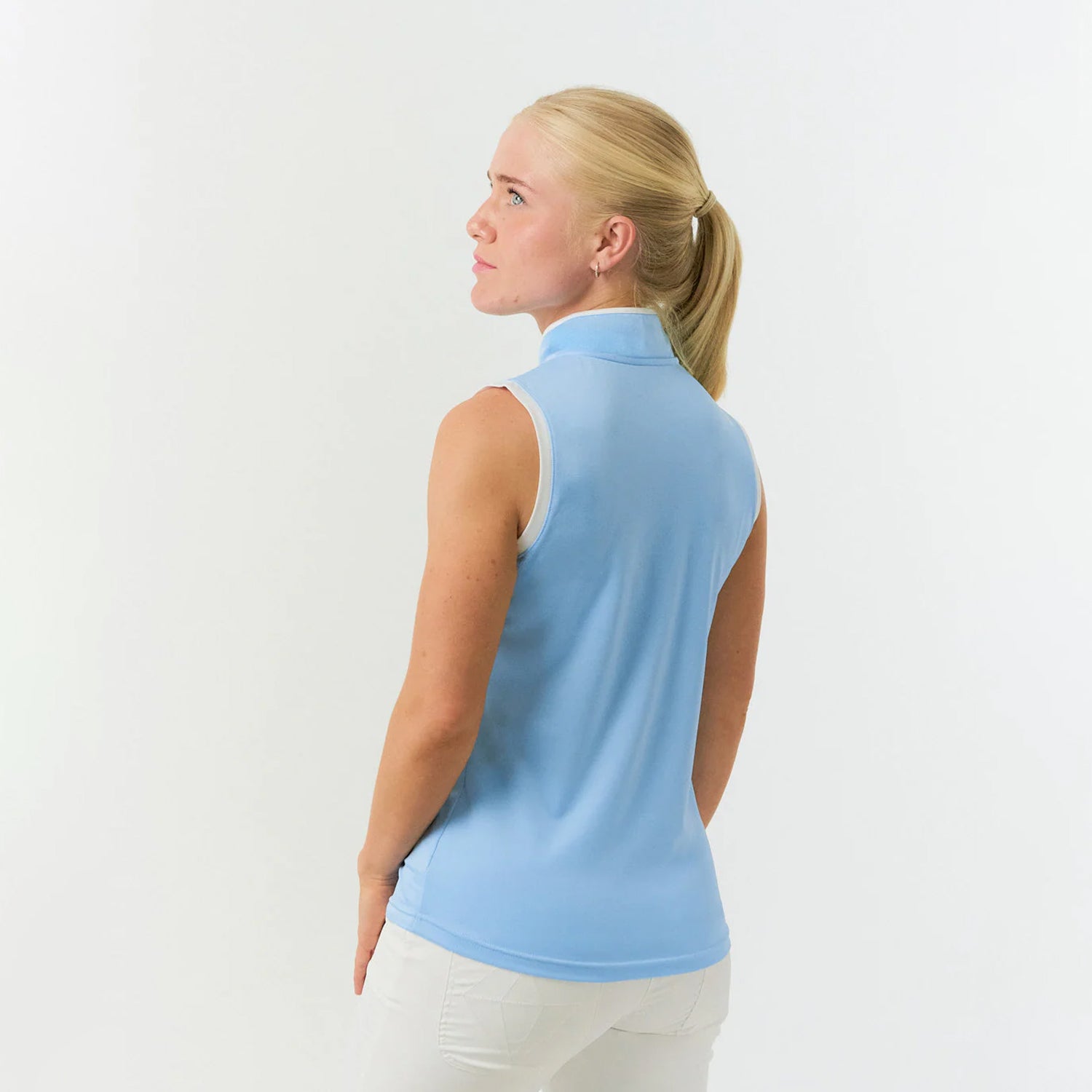 Pure Golf Ladies Sleeveless Mandarin Polo Shirt in Pale Blue