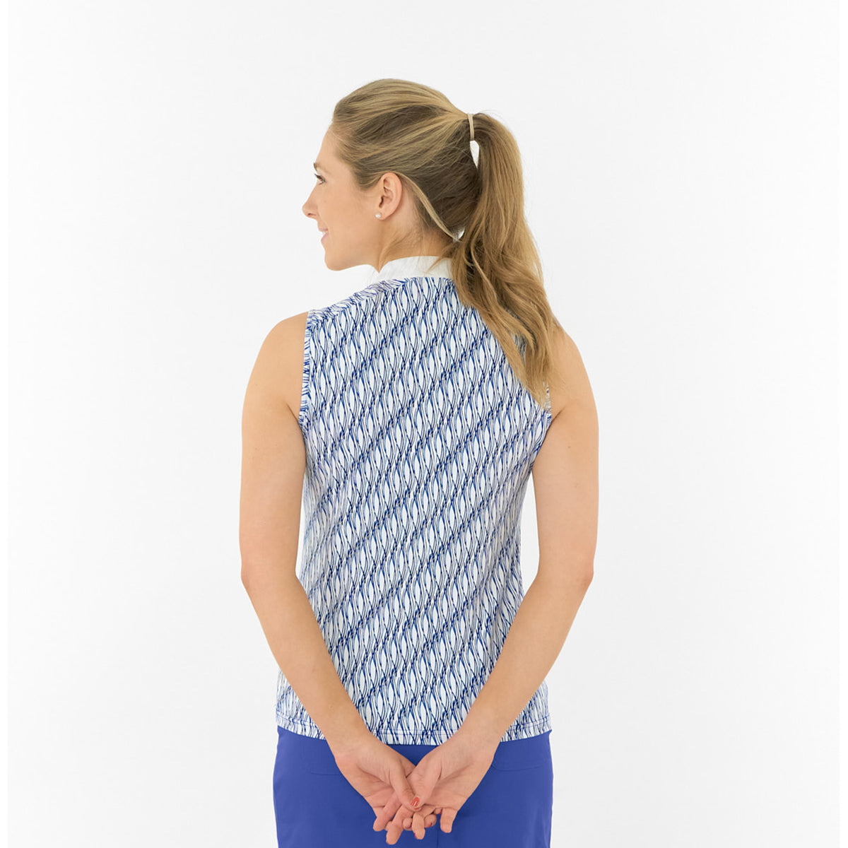 Pure Golf Ladies Sleeveless Polo with Abstract Wave Print for Standout Style on the Course