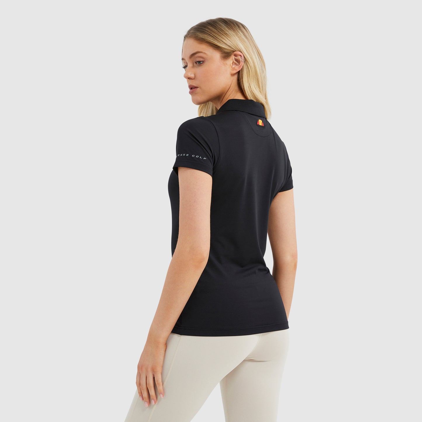 Ellesse Ladies Short Sleeve Polo in Black with Zip-Neck