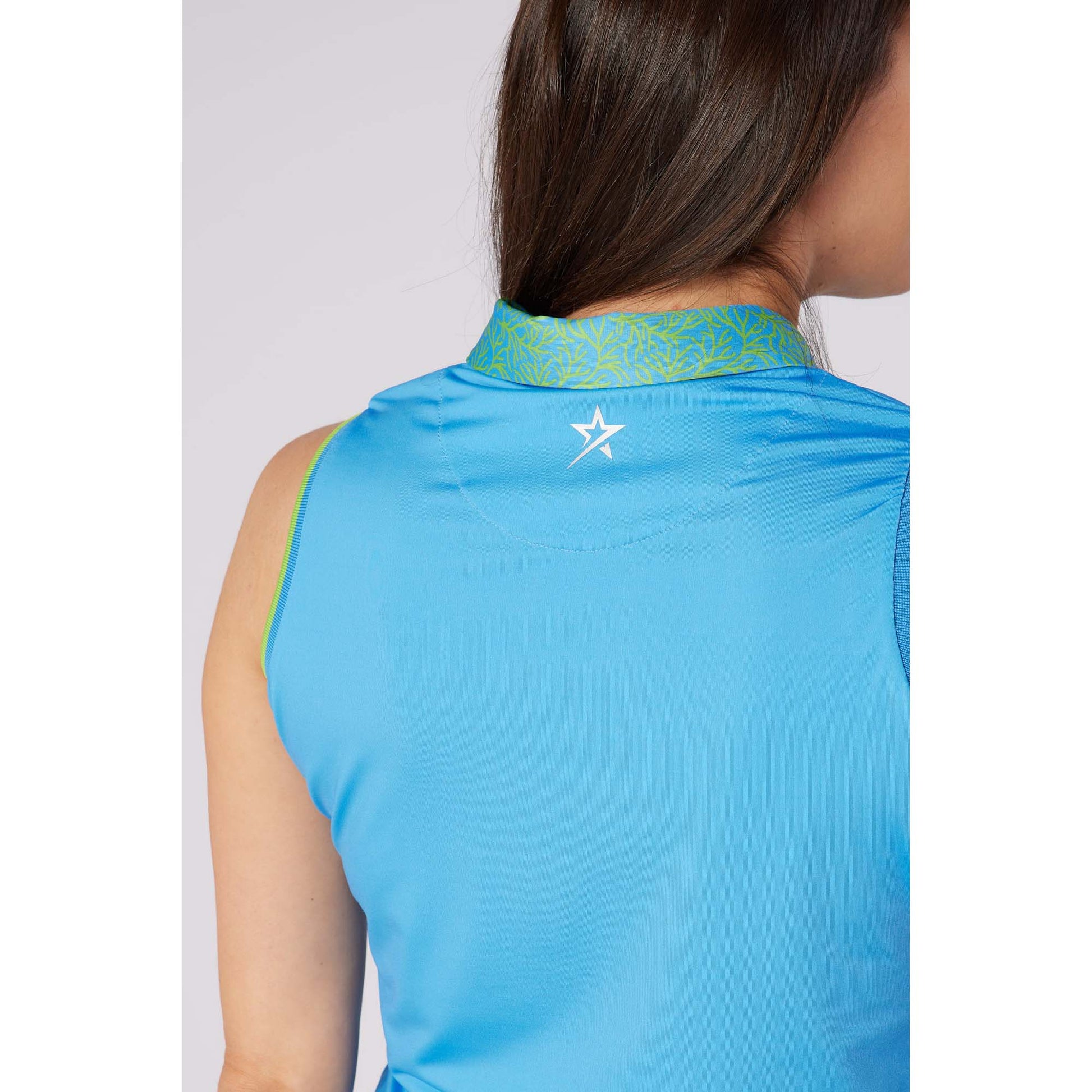 Swing Out Sister Ladies Sleeveless Polo with Subtle Print Accents for Effortless Everyday Style