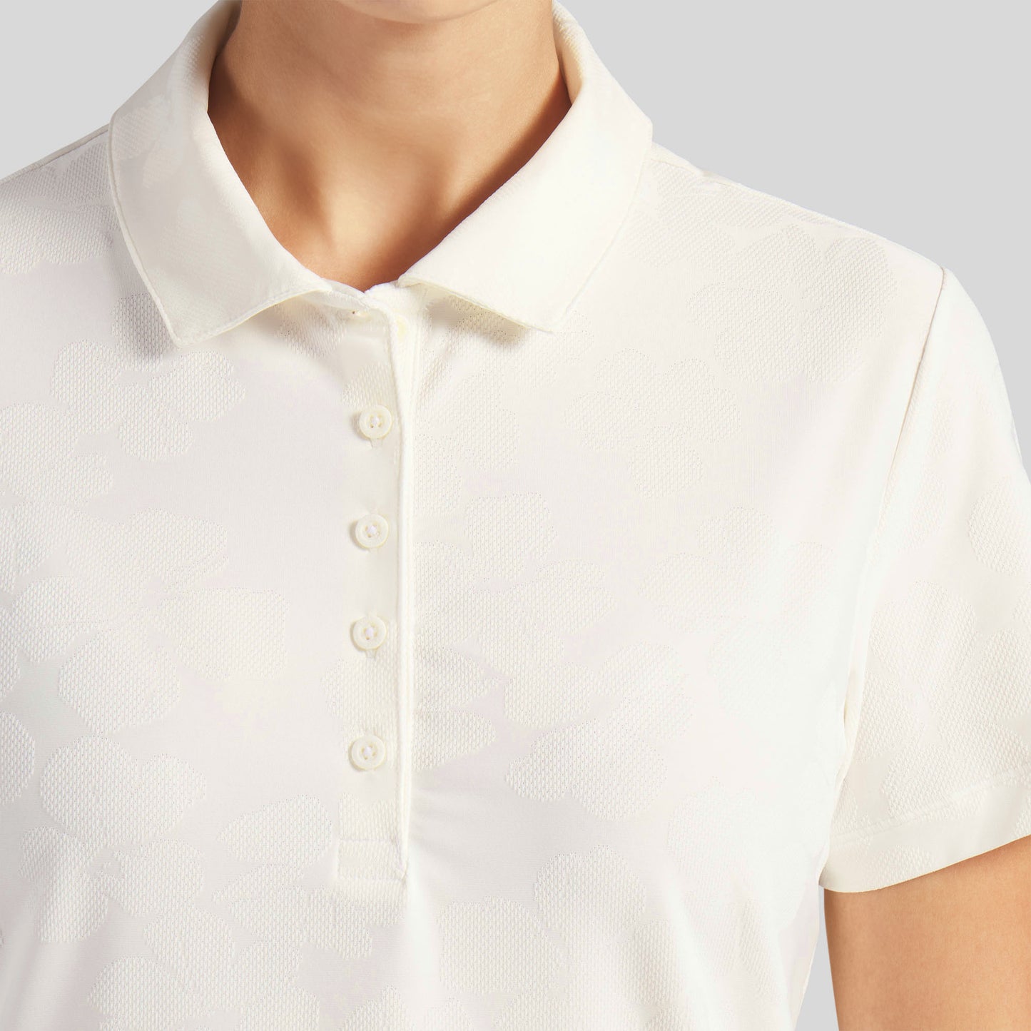 Puma Golf Ladies Short Sleeve Polo with Elegant Floral Jaquard Detail