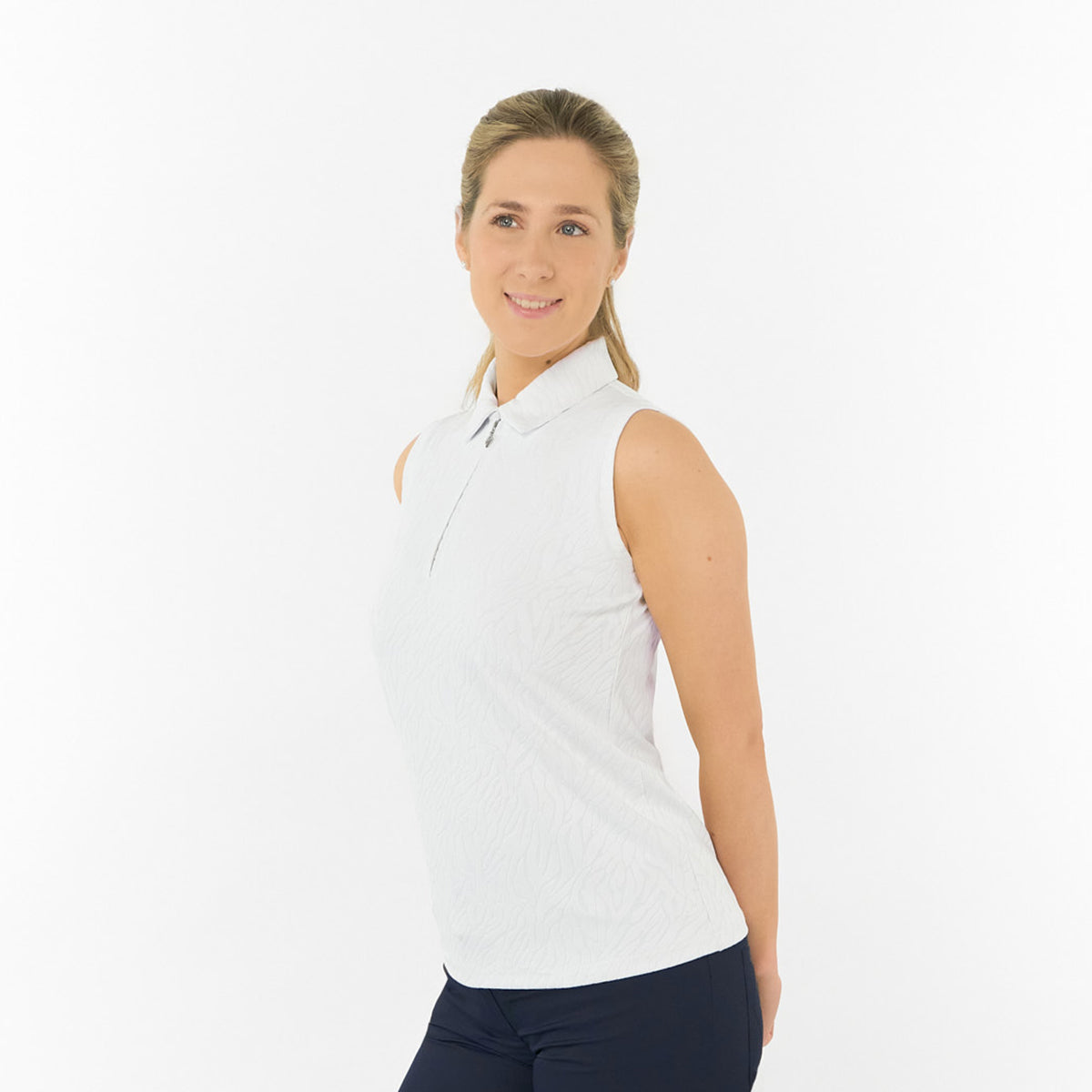 Pure Golf Ladies Textured Sleeveless Polo – Subtle Sophistication Meets Effortless Play