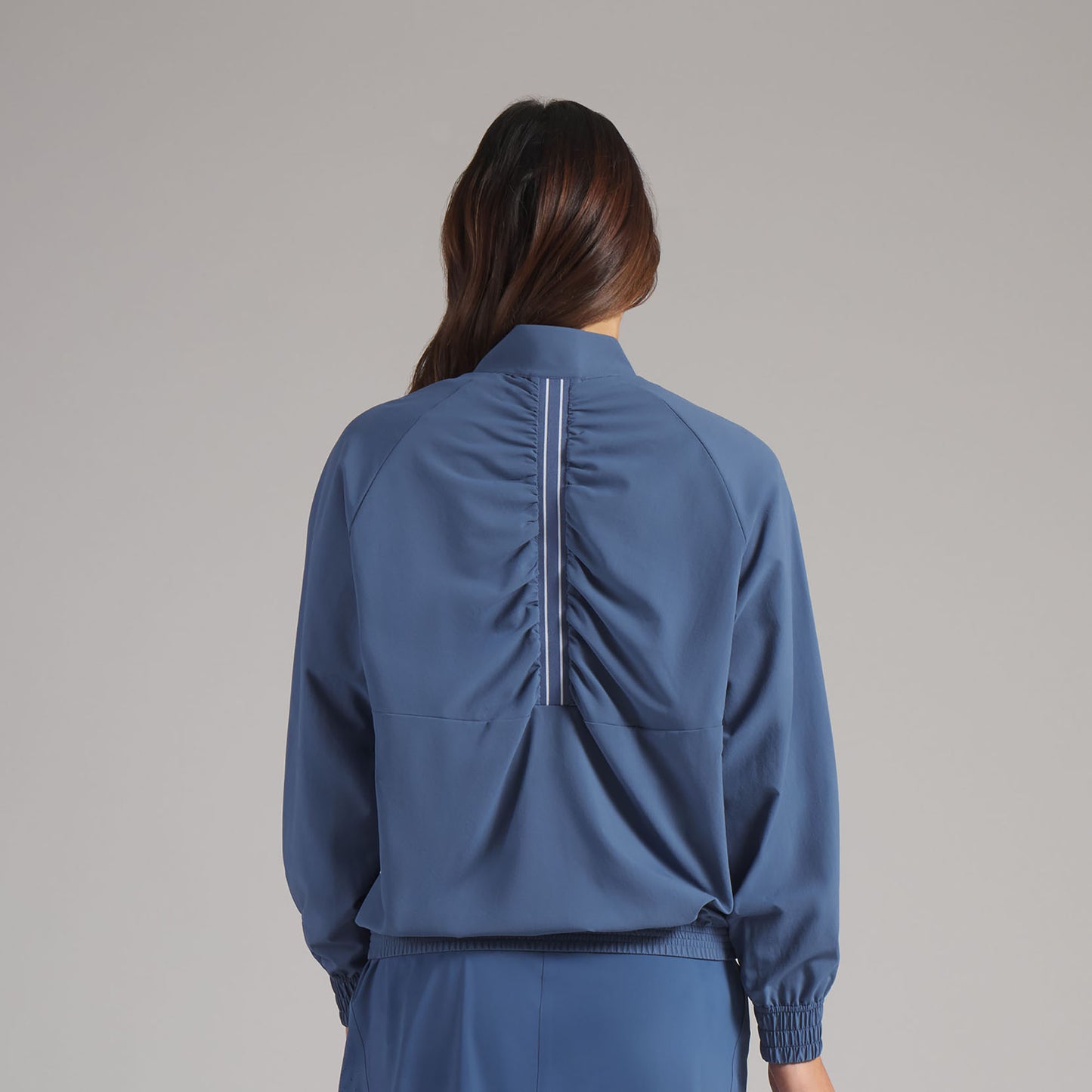 Puma Ladies Golf Wind Jacket Functional & Feminine with Swing Ready Back Detail