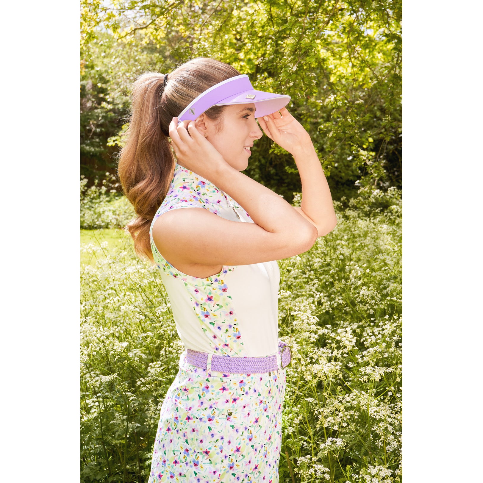 Pure Golf Sleeveless Polo with Ethereal Bouquet Print Panels & Zip Neck